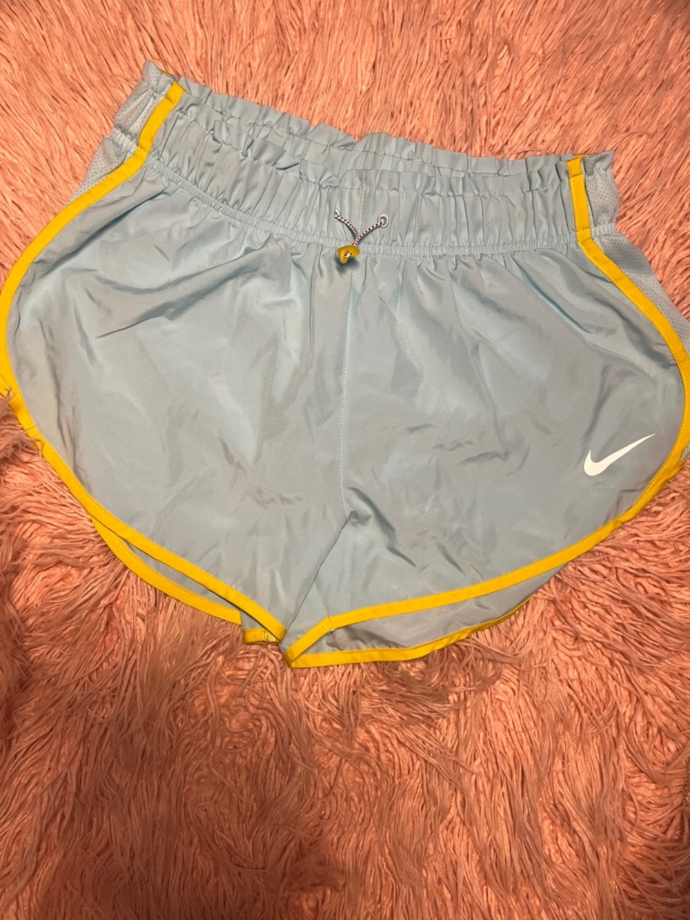 Nike Women's Sky Blue Athletic Shorts with Yellow Trim